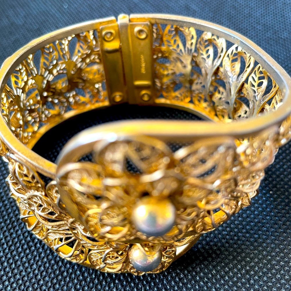 A costume spring hinge cuff.